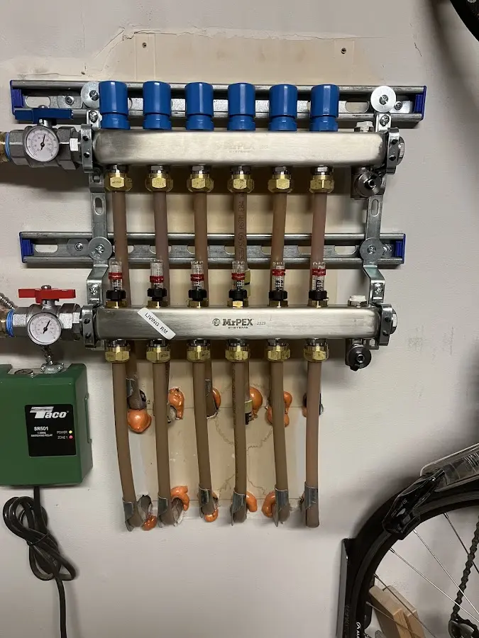 Plumber performing Water Heater Repair at a residential property in Snoqualmie